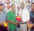 National Coach Jadeshwar Doolchand, second left, receives one of the six balls from Marketing Manager of Giftland OfficeMax Compton Babb in the presence of GVF vice-president Captain John Flores, left, and NSC staff Chitram Choonilall.  