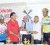 Marketing consultant of NAMILCO Afeeze Khan (center) and NAMILCO accountant Navindra Ketwaroo (second left) present the prizes to president  of Roraima Bikers Club Brian Allen yesterday while two cyclists look on.