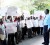 A security guard (right) looks on as FITUG members hold up placards during their picket at the Pegasus Hotel yesterday. 
