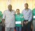 Commissioner of Police Henry Greene (second, left) poses with GTTA Secretary Godfrey Munroe, second, right, and national players, from left: Idi Lewis, Natalie Cummings and Christopher Franklin after presenting them with airline tickets to participate in the CAC Games. 