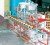 A section of the Torginol automatic filling line at Ruimveldt.  Inset is Continental Group of Companies Chairman Rakesh Puri.