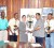 DDL brand manager Maria Munroe (centre) presents the sponsorship cheque and championship trophy to President of the GCB Chetram Singh in the presence of members of the GCB (Orlando Charles Photo)