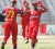 The Lions celebrate the fall of a Guyana Wicket