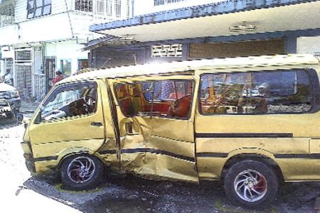 This bus narrowly missed a newspaper vendor and her family at the Camp and Lamaha Streets junction. 