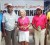 Winner of the Sanjay’s Jewellery golf tournament on Saturday Rita Heikens, centre, is flanked by from left, William Walker, Muntaz Hanif, Avinash Persaud and Alfred Mentore following the tournament.