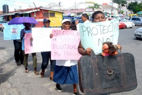 The group from the PNCR as they protested in front of the Ministry of Human Services yesterday.