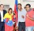 Venezuelan Ambassador to Guyana Dario Morandy, second from left, strikes a pose with Venezuelan Breilor ‘Zulianito de Oro’ Teran (left) and Colombian Olga ‘La Mona’ Julio (third from left) at his Thomas Street office yesterday. Also in the photo (from right) are Carlos Cuevas, Teran’s trainer, and Carwyn Holland. (Orlando Charles photo)