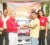 Banks Beer brand manager Brian Choo Hen hands over the sponsorship cheques to Andrew King left  and Dennis Persaud while Banks DIH officials and the Banks Beer girls savour the moment.  