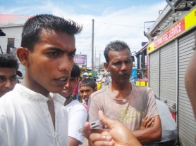 Seenarine Sitaram (right) and his son, Nageshwar speaking with reporters yesterday