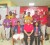Guyana 2010 Open Golf winners. Male winner Avinash Persaud and female winner Christine Sukhram are in the front row along with Banks DIH Limited Sales and Marketing executive Carlton Joao.