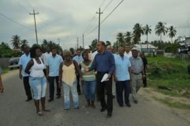 The President with Plaisance residents (GINA photo)