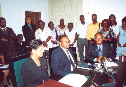Winston Murray (right) speaking after the PNCR had walked out of Parliament on August 3, 2007.  Seated at centre is PNCR Leader Robert Corbin while at left is Clarissa Riehl.