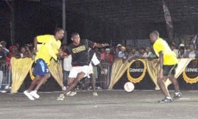 Guinness Greatest of de Street Futsal competition exhibition play last night. Broad Street (in yellow) defeated Alexander Village on penalties in overtime. (Orlando Charles photo)