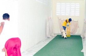 An Essequibo batsman drives on the front foot during a practice session yesterday at the Chetram Singh Centre of Excellence training facility. (Orlando Charles photo)