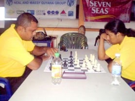 Kriskal Persaud (left) makes a move during his match against winner Taffin Khan on Wednesday night. 