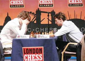 Carlsen studies deeply during his game with English grandmaster Luke McShane at the London Chess Classic.