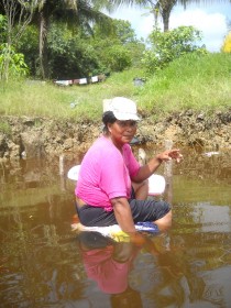 Cheryl Sandy doing some chores at the Supenaam Creek last week. 