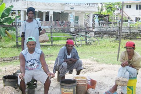 Some of the men selling hassar they caught in the Abary Creek