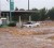 Partially submerged vehicles are seen during flash floods in Toowoomba, Queensland January 10, 2011. (Reuters/Daniel Breeze)