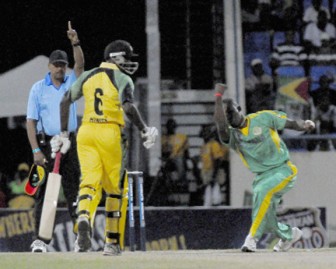 Royston Crandon  celebrates the wicket of Jerome Taylor of Jamaica. (Randy Brooks photo)