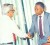 In this 1987 photo from Guardian’s archives, then prime minister ANR Robinson shakes hands with Basdeo Panday who was a member of his NAR Cabinet. 