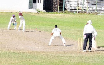 Rajendra Chandrika drives down the wicket during his century yesterday at the Georgetown Cricket Club (GCC) Ground, Bourda, yesterday. (Orlando Charles photo).