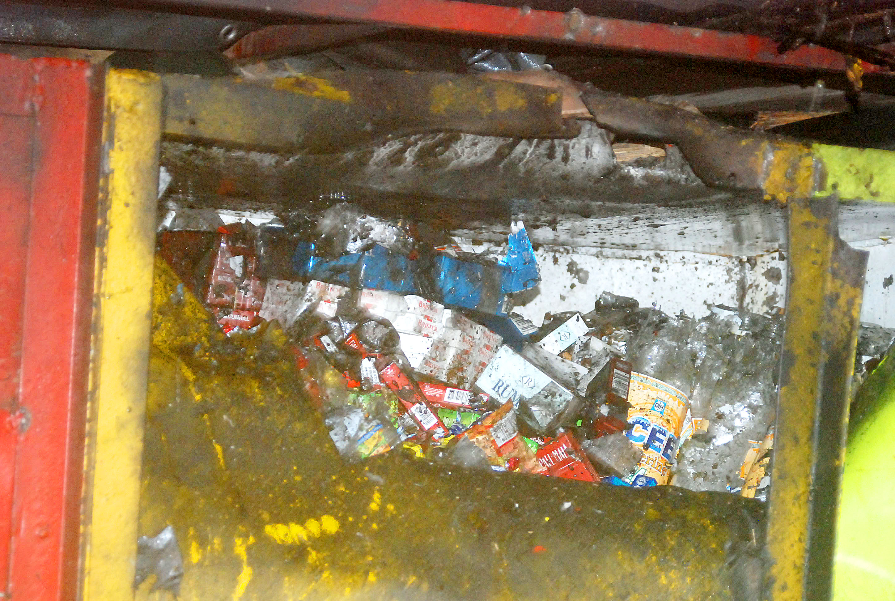 The damaged cooler in Mark Hyman's stall hours after the explosion. (Jules Gibson photo)