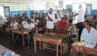 A member of the public questioning the PNCR contenders for the presidential candidacy on Sunday at the Skeldon High School Annex.