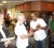 Tourism Minister Manniram  Prashad (second from right) exchanges tokens with Captain David Owen yesterday on board the Saga Pearl 2 as Tourism and Hospitality Association of Guyana (THAG)  president Paul Stephenson (left) looks on.