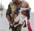 An Egyptian soldier holds a baby on top of his tank as he poses for photographs inside Tahrir Square in Cairo yesterday. (REUTERS/Dylan Martinez)