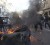 A dumpster burns on a street during clashes between protestors and police near Azadi Square in Tehran February 14, 2011.  (Reuters/Your View)