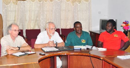 GRFU president Kit Nascimento (second from left) addresses the media during a GRFU press conference held yesterday at the Olympic House, High Street. Others in photo from left are Mike McCormack, Robin Roberts and Theodore Henry. (Orlando Charles photo)