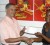 Treasurer of the Guyana Chess Federation, Shiv Nandalall (left) receives the sponsorship cheque. for the Republic Anniversary Rapid Chess tournament from DDL Brand Executive Alexis Crawford.