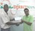 Marlon Wade, Operations Officer of Bill Direct, presents the sponsorship cheque to GFSCA member Lalta Gainda.