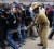 An Indian policeman uses a bamboo stick in an attempt to control cricket fans jostling to maintain their position after a minor stampede in a queue for tickets at The M. Chinnaswamy Stadium in Bangalore on February 24, 2011, ahead of the Cricket World Cup match between India and England match. India play England on February 27, in Match 11 of the ICC Cricket World Cup 2011 tournament. AFP PHOTO/Indranil MUKHERJEE 
