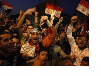 Opposition protesters celebrate Egypt's President Hosni Mubarak's resignation, from their stronghold of Tahrir Square in Cairo February 11, 2011.  REUTERS/Suhaib Salem
