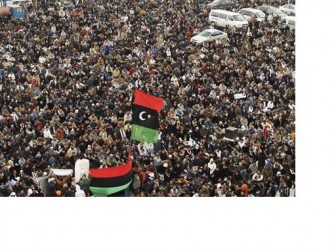 Anti-Gaddafi protesters attend Friday prayers in Benghazi February 25, 2011. REUTERS/Suhaib Salem