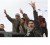 Protesters celebrate in the streets of Tobruk, February 22, 2011. REUTERS/Asmaa Waguih
