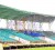 Face lift! Yesterday, workmen feverishly set about sprucing up the Green Stand of the Guyana National Stadium by painting the roof. For the next four days, starting today, Guyana will be playing the England Lions in the WICB Regional Four-Day tournament. (Orlando Charles photo)