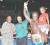 Referee Eion Jardine raises the hand of Kwesi Jones after winning Guyana’s light heavyweight title on Friday night at Cliff Anderson Sports Hall. Also in the photo is Mayor of Georgetown Hamilton Green. (Orlando Charles photo)