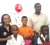 Scotiabank Marketing Manager Jennifer Cipriani and cricketer Reon King pose with the winners in the Kiddy Cricket Mascot contest winners Runako Williams, Kayshav Tewair and Kande Skeete. 