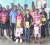 Winners in the Rotary Club of Stabroek’s Spelling Bee display their prizes as they pose with Rotarians. 