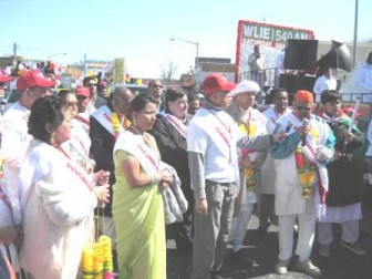 Officials performing prayers at the start of the Phagwah parade in Richmond Hill, New York on Sunday afternoon. Thousands of Guyanese Americans and celebrants from other nations  turned up to play phagwah. (Photo courtesy of Vishnu Bisram)