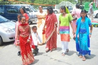 Young devotees on their way to Shiva Raatri observances at the Cove and John Ashram on Thursday.