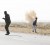 Rebels run from explosions during a mortar barrage fired by troops loyal to Muammar Gaddafi outside Brega in eastern Libya, April 1, 2011. (Reuters/Finbarr O’Reilly)