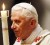 Pope Benedict XVI arrives holding a candle as he leads the Easter Vigil mass in Saint Peter’s Basilica in Vatican yesterday. (Reuters/Alessandro Bianchi)