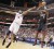 Philadelphia 76ers Andre Iguodala races to challenge a shot attempt  by Le Bron James of the Miami Heat. (Reuters photo)