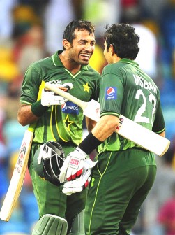 Wahab Riaz  and Misbah-ul-Haq celebrate victory against the West Indies yesterday in Barbados.