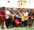 President Bharrat Jagdeo assists school children in cutting the ribbon to the new Childcare and Protection head office yesterday. (See  story on page 8)