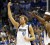 Dallas Mavericks’ Dirk Nowitzki (L) of Germany celebrates a basket by a teammate against the Los Angeles Lakers during Game 4 of the NBA Western Conference semi-final basketball playoff in Dallas, Texas on May 8.